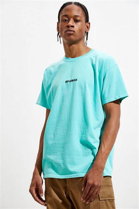 Stand Out with Our Turquoise Graphic Tee - Shop Now!